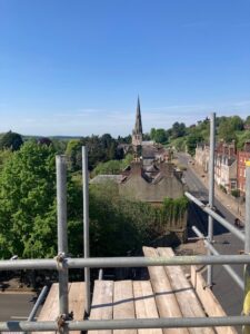 A view from the roof of Ashbourne Methodist Church looking along Church Street towards St Oswald's Church and the former Queen Elizabeth's Grammar School building.
