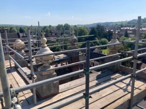 The finials on top of the building, some of which need securing or replacing (it seems a couple of 1960s replacements were made of wood which we'll replace like-for-like)