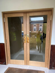 The new doors into Trinity Hall from the Church Street Foyer