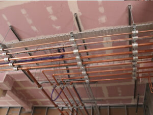 In Gateway Lodge water pipes for heating, hot and cold water (for the en-suites etc) are installed. There will be a new ceiling below them.